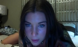 Felicity Feline jerks close by a huge dildo on webcam