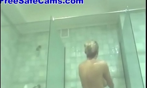girl with big bosom takes a shower